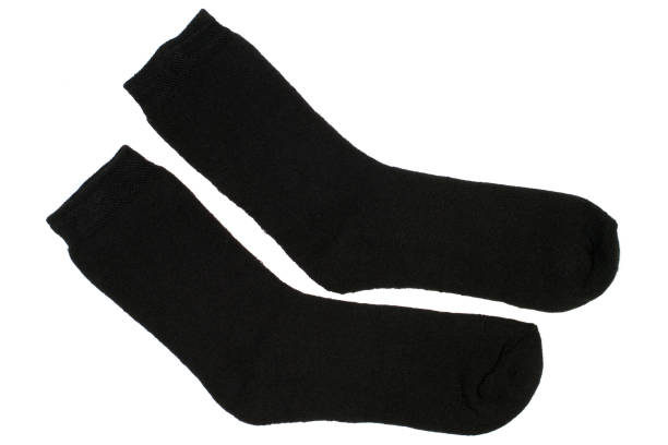 istock A pair of black men's socks on a white background. 1854143302