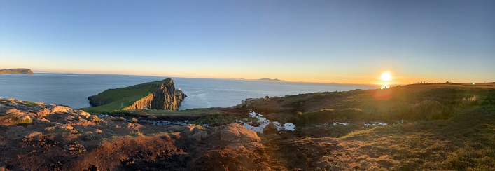 A panoramic view of the majestic Isle of Skye, United Kingdom, at sunset.