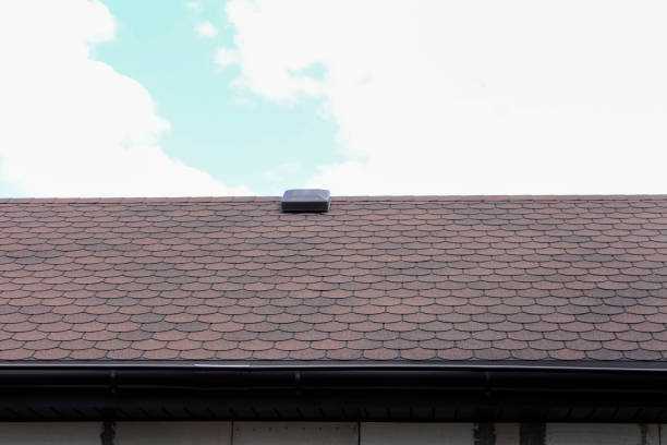 istock Bituminous shingles roof. Waterproofing of new building. Brown bituminous flexible tile pattern, background, texture, construction covering material, roof 1854162243