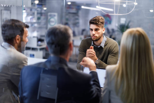 istock Male candidate talking to human resource team on job interview. 1854181049