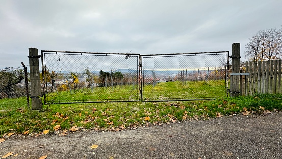 Large closed garden gate