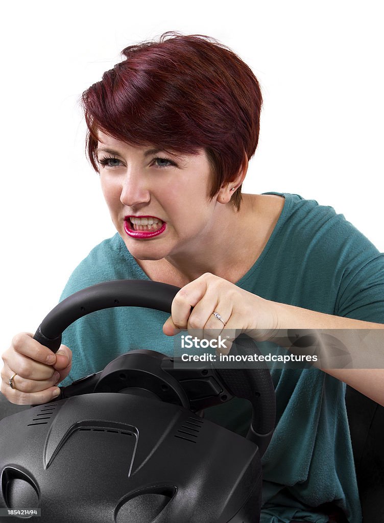 Agressive の若い女子ドライバ、白色背景 - カジュアルウェアのロイヤリティフリーストックフォト