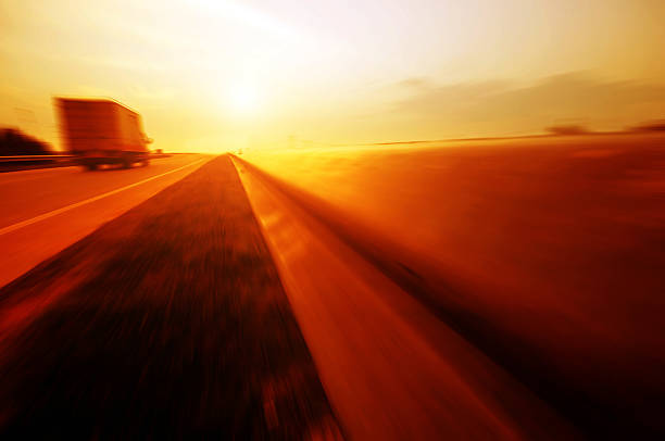 istock Country road with a dark sky 185424474