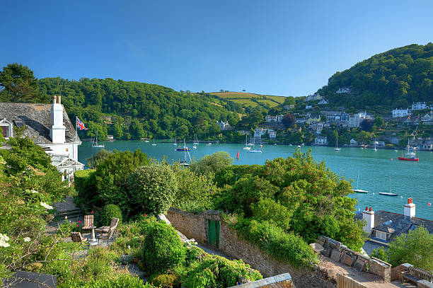 Dartmouth from Kingswear Summer evening overlooking the Dart Estuary, Dartmouth, Devon, England. estuary photos stock pictures, royalty-free photos & images