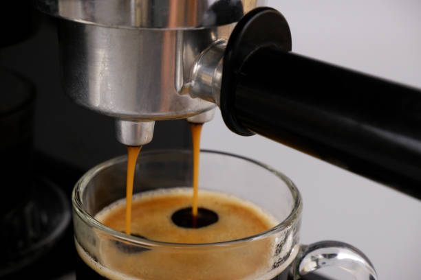 istock Coffee maker with cup of espresso coffee. 1854259003