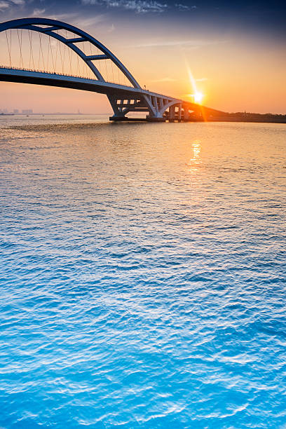istock Xiamen wuyuan bridge at sunrise 185427129