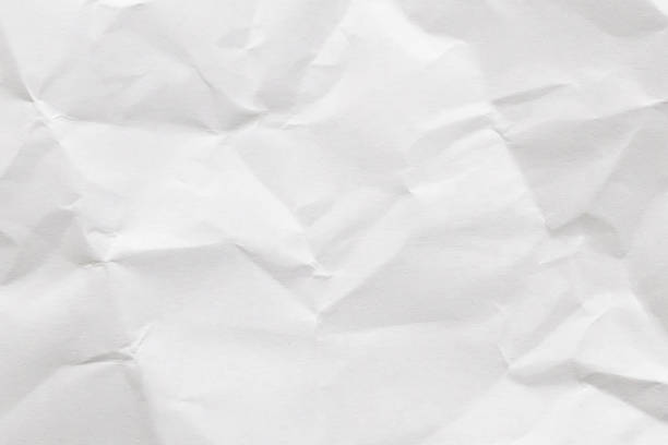 istock Abstract white crumpled and creased recycle paper texture background 1854274002