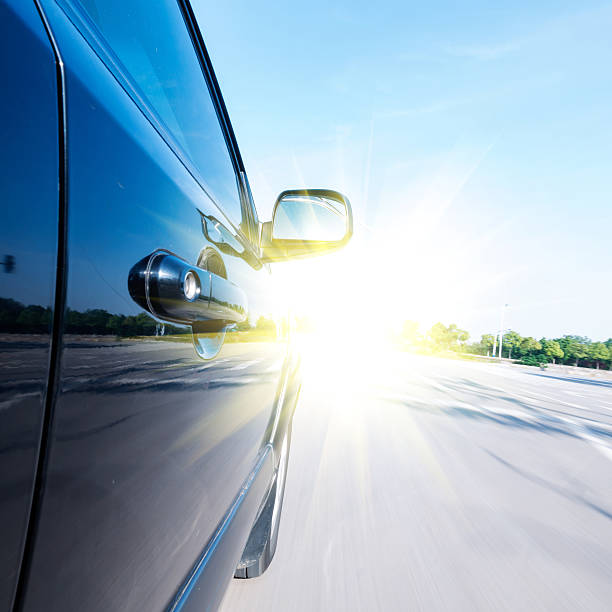 istock car on the road with motion blur background 185428734