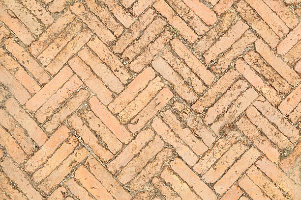 istock Red brick paving stones on a sidewalk 185429344