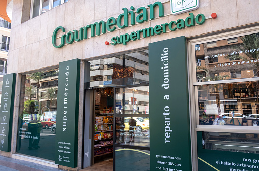 Grocery store Gourmedian and city center of Alicante, Spain