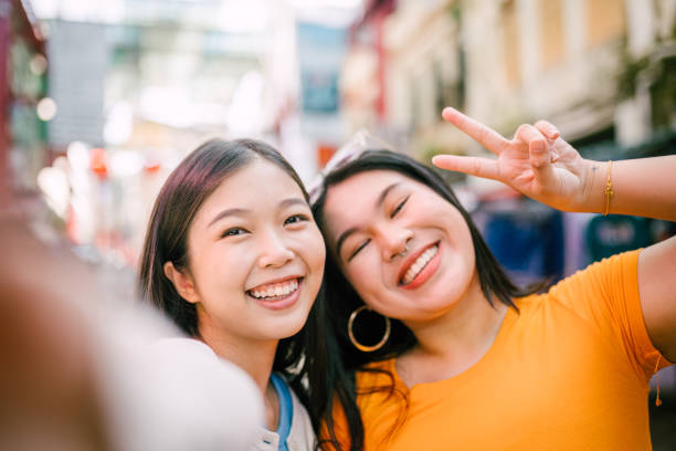 istock Happy Asian Best Friend Taking Selfie Together. 1854323336