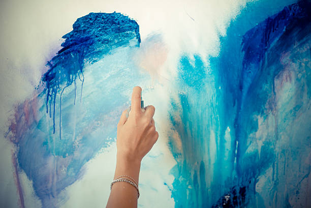istock beautiful blonde woman painter 185433733
