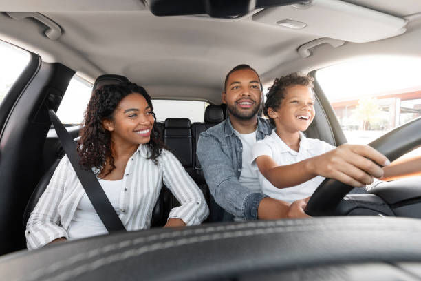 istock African American Father Teaching His Son To Drive Car 1854349201