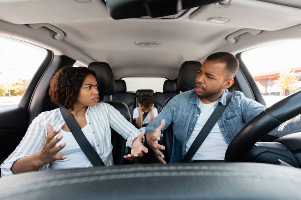 istock Black boy child suffering while parents fighting during road drip 1854350236