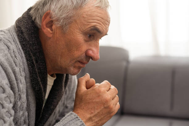 istock Portrait of senior man on white background 1854364081