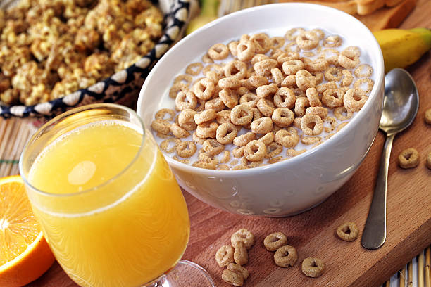 istock Breakfast with milk, cereals an orange juice 185437180