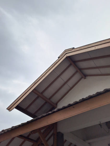 istock minimalist house roof background sky 1854374285