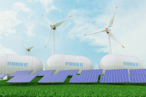 風力タービン、太陽光および水素エネルギー貯蔵ガスタンクによる再生可能エネルギーのコンセプト - fuel storage tank industrial building construction development ストックフォトと画像