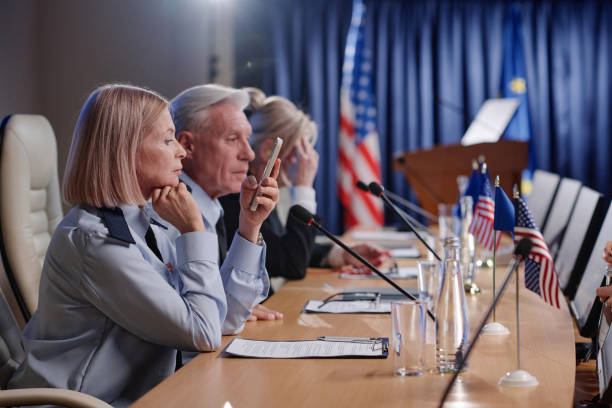 istock People sitting at business conference 1854375367