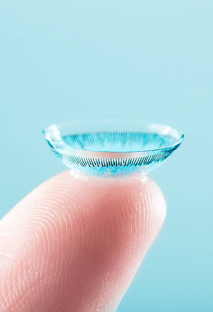 istock contact lens on finger 185437915