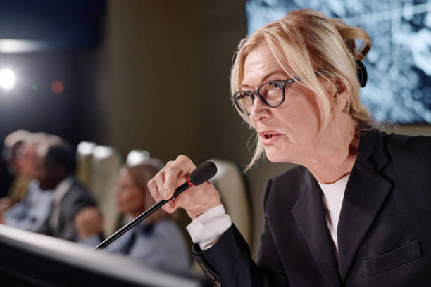 istock Politics performing with her report 1854390307