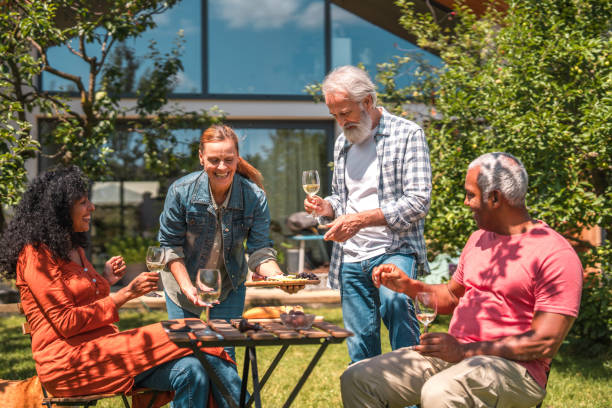 istock Picnic Bliss: Smiling Senior Friends Create Lasting Memories 1854401072