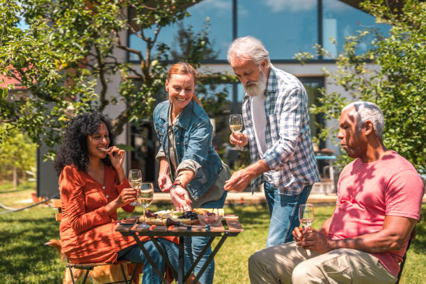 istock Diverse Senior Friends Cherish Picnic Time 1854401076