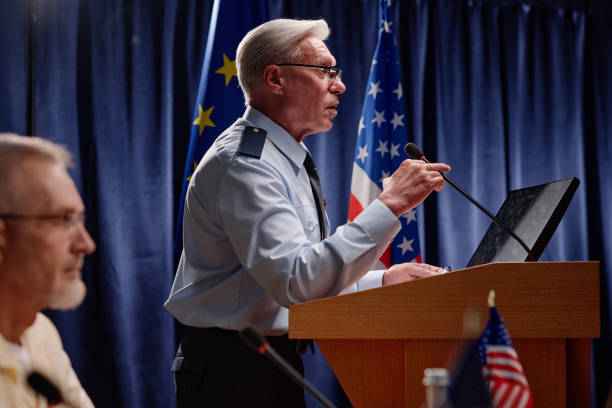 istock Politician performing at military conference 1854407175