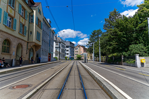 Diminishing perspective of tramway at tram station Beckenhof at City of Zürich on a sunny hot summer day. Photo taken July 20th, 2023, Zurich, Switzerland.