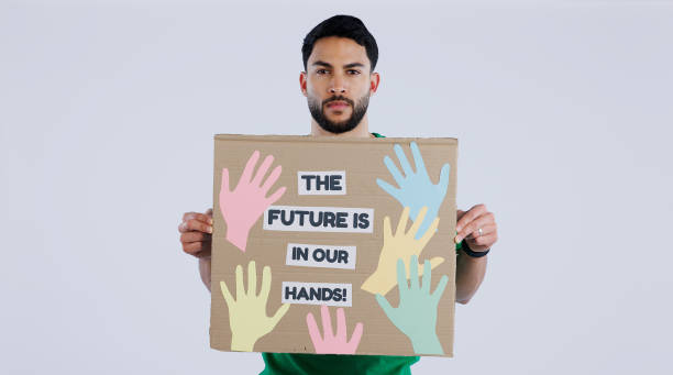 istock Man, future and environmental earth poster for social justice or human rights, studio or white background. Male person, portrait and climate change or planet help, pollution protest on cardboard sign 1854436414