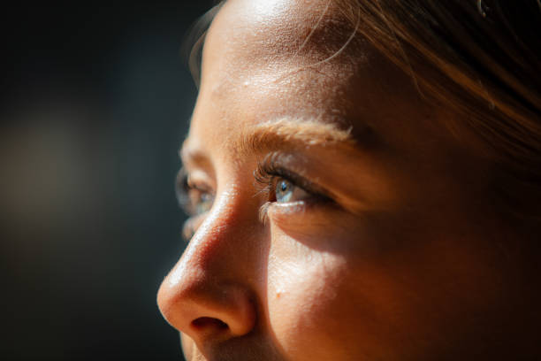 Close-up blue eyed woman face.