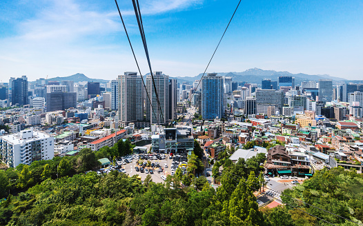 Seoul, South Korea, June 17, 2023: The city view from the cable car while ascending to N-Seoul Tower, a popular tourist destination in Seoul.