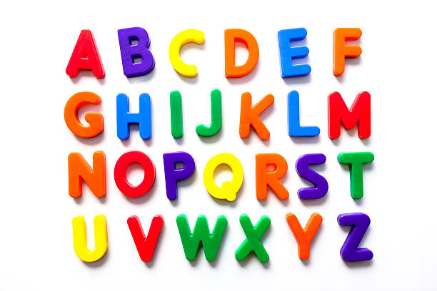 Alphabet in vintage colorful refrigerator magnets magnetic letters toys letter f photos stock pictures, royalty-free photos & images