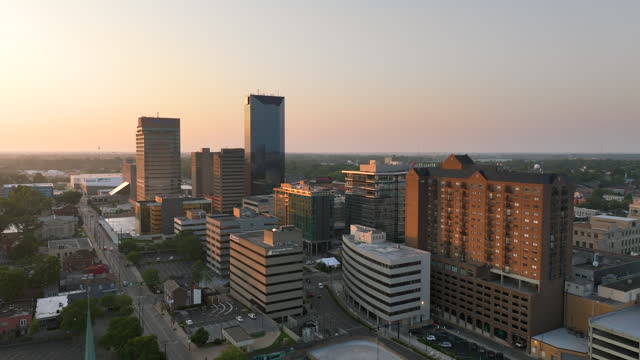 Lexington Kentucky urban architecture in city downtown at sunset. Panoramic view of business district skyline with high-rise buildings