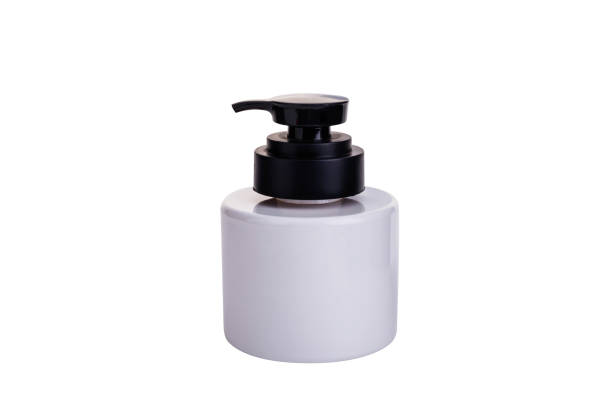 istock Unbranded white dispenser bottle, cosmetic package mockup, isolated on white background. 1854478419