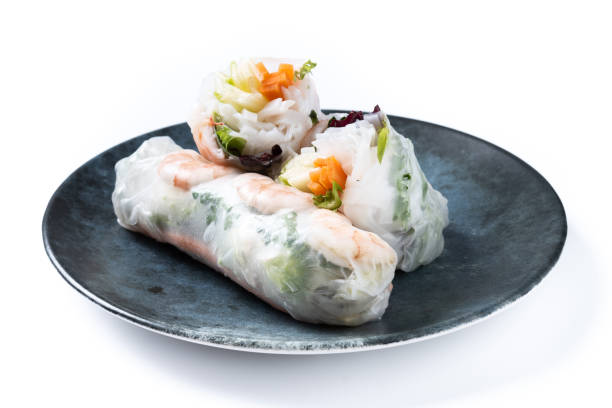 istock Vietnamese rolls with vegetables, rice noodles and prawns isolated on white background 1854518326
