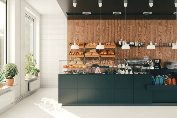 Modern Bakery Cafe Modern bakery cafe with display of bread, cakes, and pastries. small restaurant interior stock pictures, royalty-free photos & images