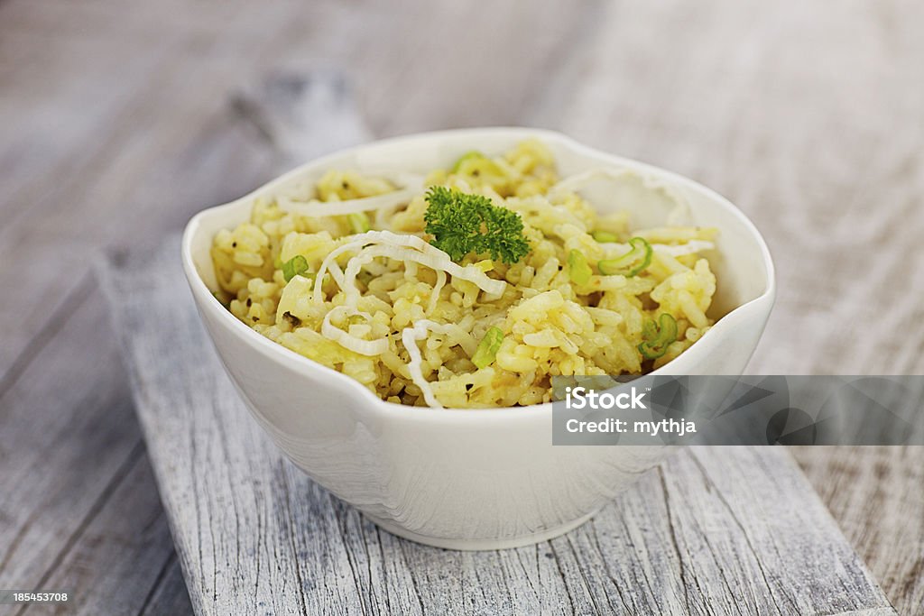 Leek risotto Vegetarian food. Leek risotto with garnish Leek - Vegetable Stock Photo