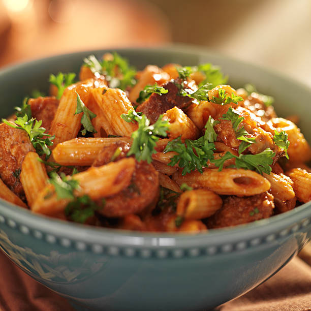 istock bowl of rigatoni pasta with sausage 185457662