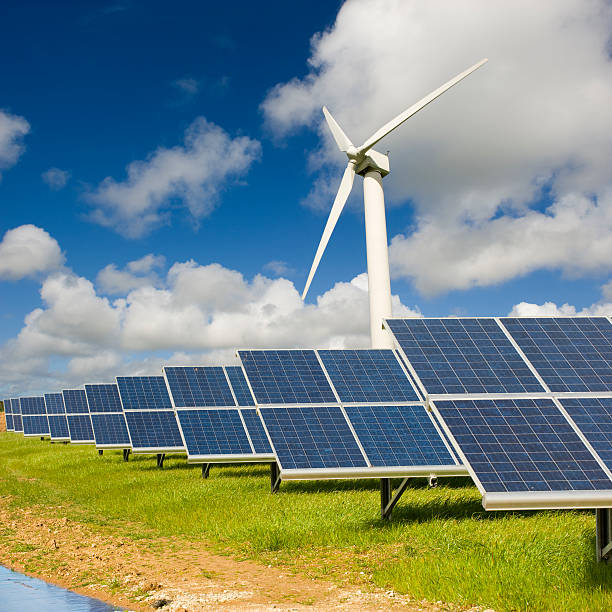 istock Wind turbine and solar panels. 185459337