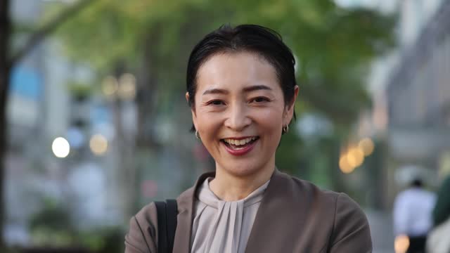 Portrait Of Mid-Age Business Woman iIth Smile