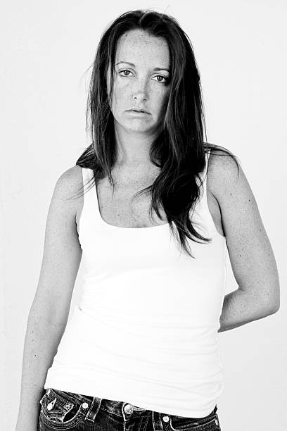 istock Black and white portrait of serious brunette model 185460839
