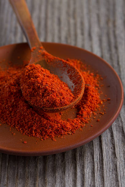 istock Sweet paprika in a spoon. 185461584