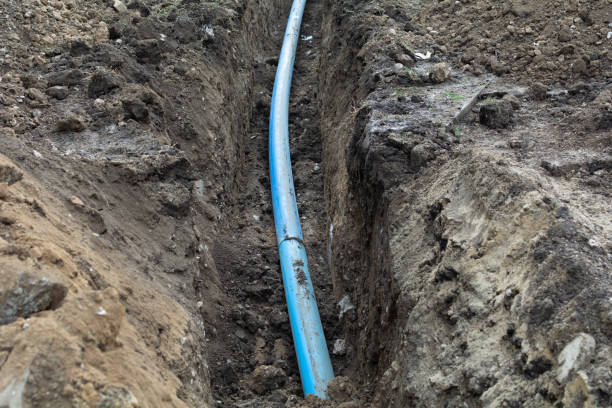 istock Plumbing pipe laying. Plastic polypropylene pipe. Sanitary, sewer drainage system for a multi-story building. Civil infrastructure pipe, water lines and storm sewers. Selective focus, shallow depth 1854622580