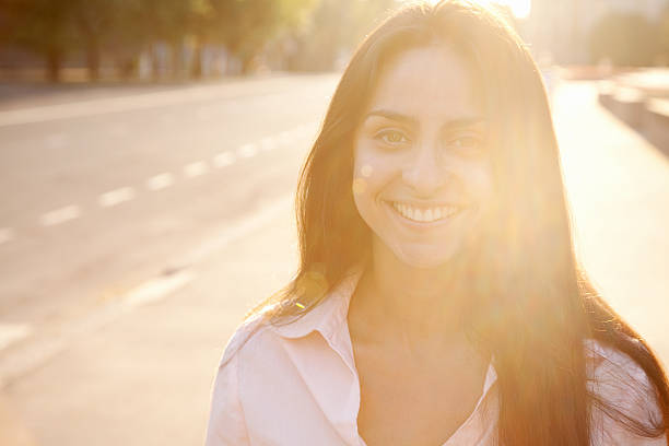 istock Young beautiful woman outdoors 185462436