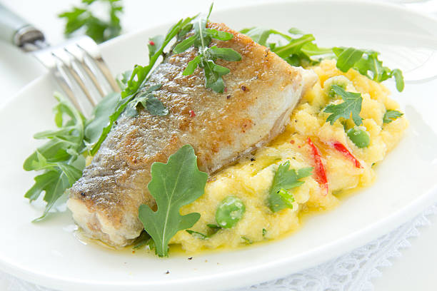 istock Grilled trout with couscous and vegetables. 185462467