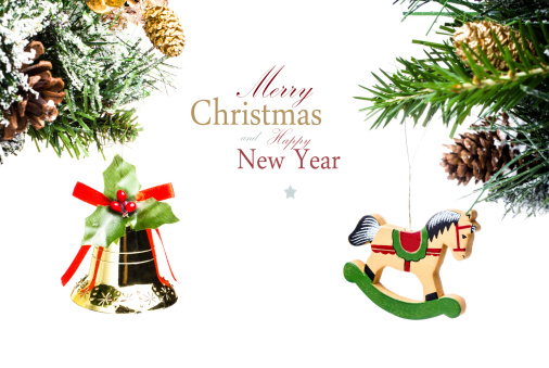 Christmas card with golden bell  and wooden horse with decorations (with easy removable sample text)