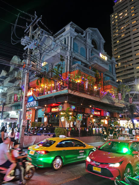 Crowded Soi 11 at night by the Hillary 11 bar. Soi 11 is a busy nightlife street in Sukhumvit, Bangkok.