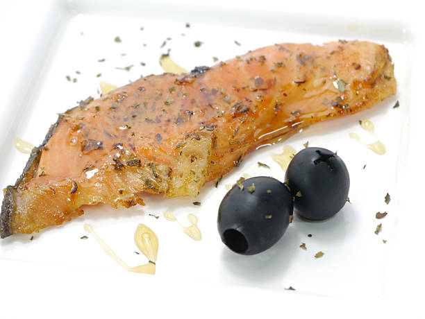 istock Salmon fried with spices and topped honey 185464917
