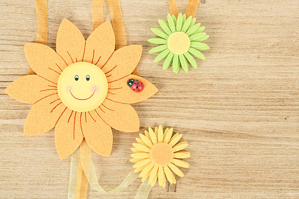 istock wooden board for spring message with flowers 185465029